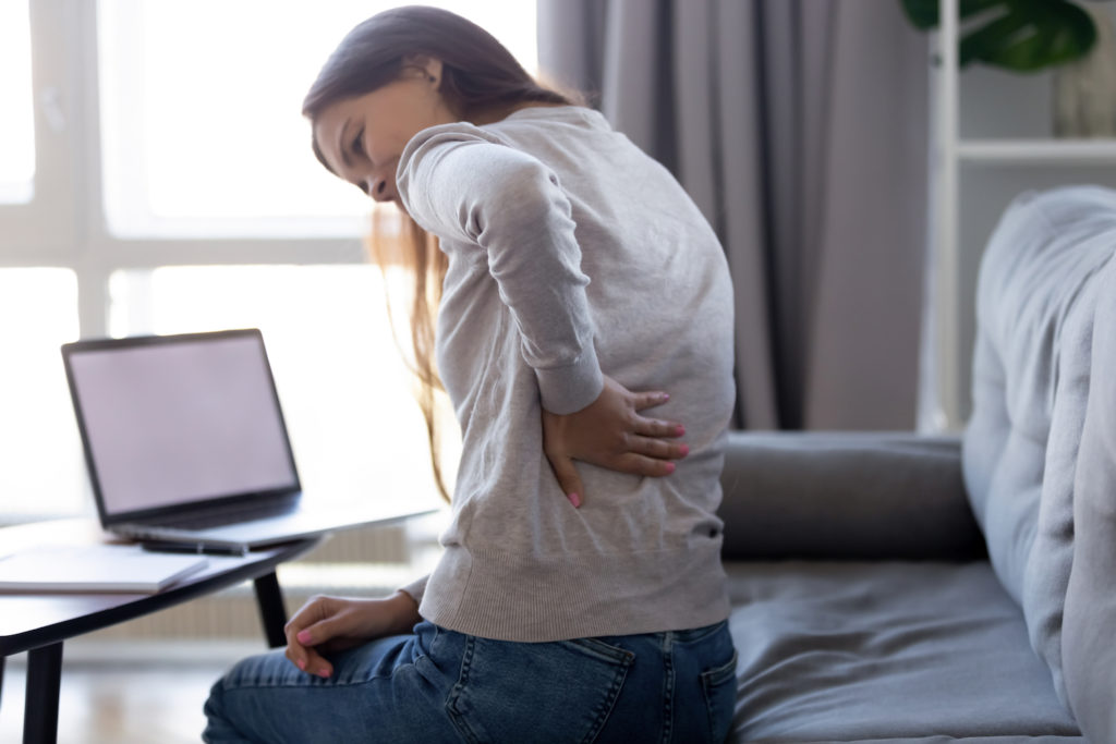 woman having a back pain