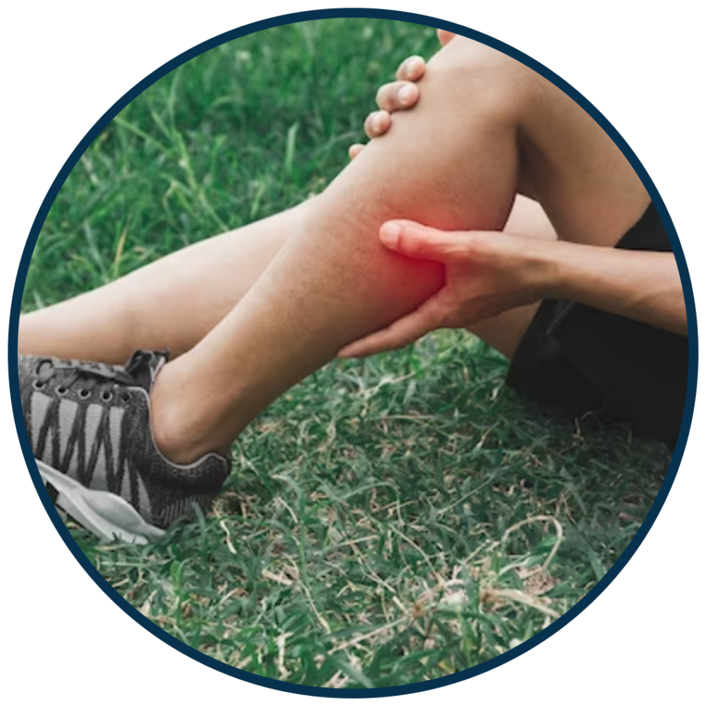 man holding leg due to pain while exercising